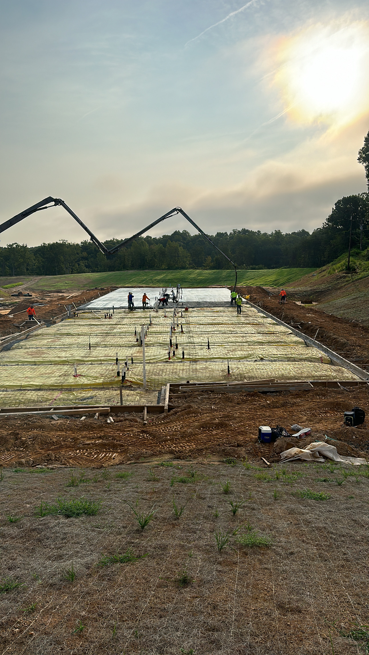 Eastland Concrete crew pouring a large concrete foundation with pump trucks